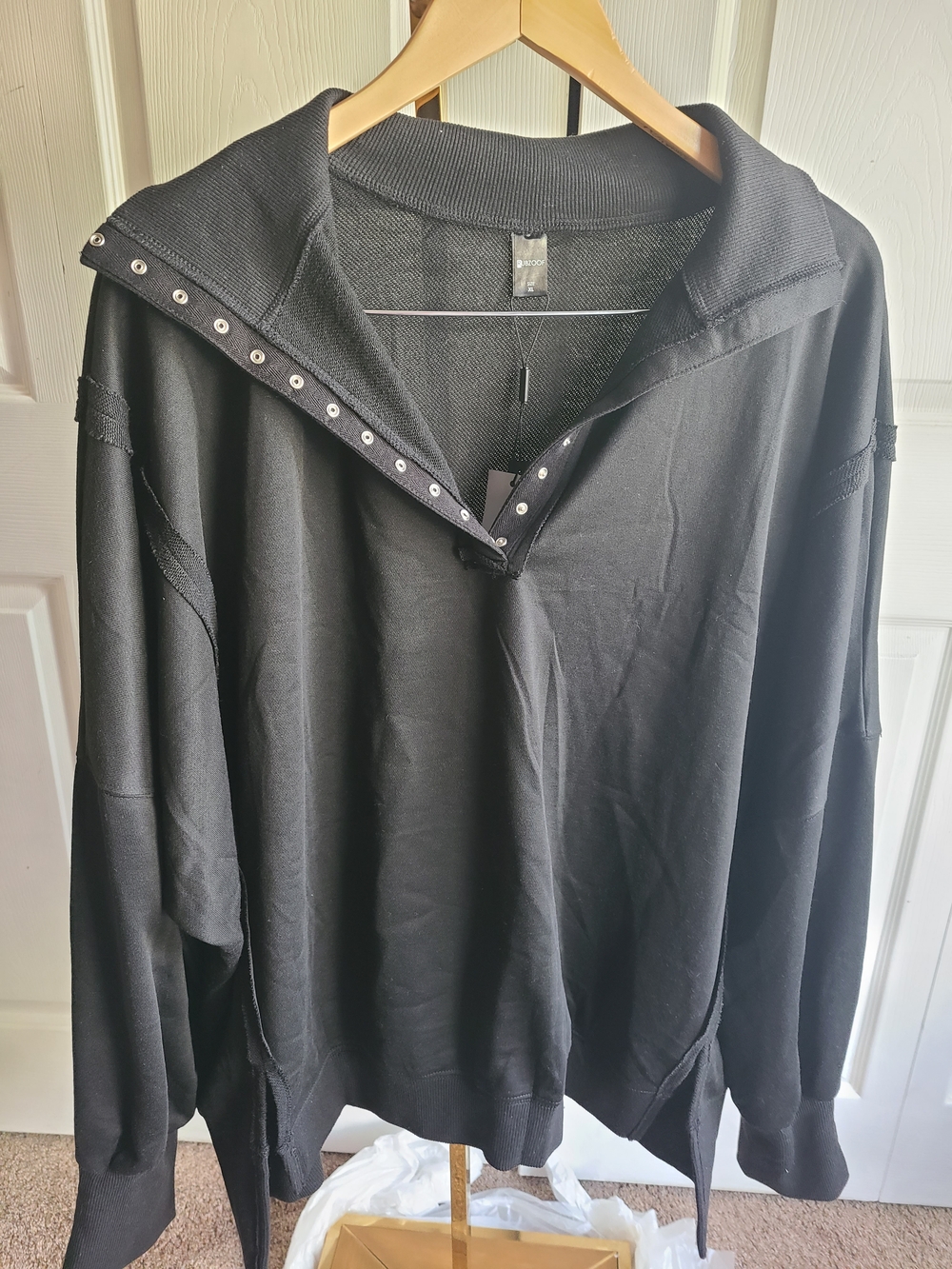 Women’s Black V‑Neck Snap Detail Sweater